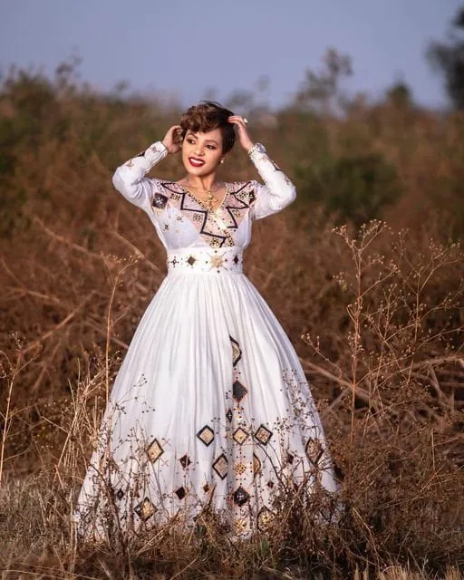 Luxurious Menen: A Stunning Ethiopian Tilf Habesha Dress