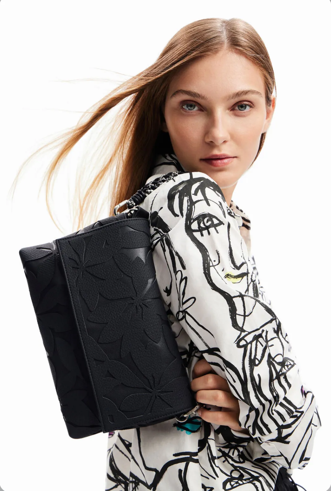 Midsize die-cut flower crossbody bag