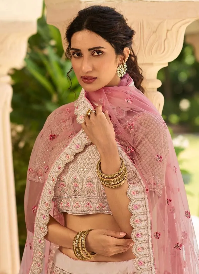 Sumptuous Stone And Zari Work Peach Color Crepe Fabric Lehenga Choli