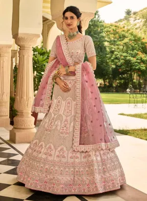 Sumptuous Stone And Zari Work Peach Color Crepe Fabric Lehenga Choli